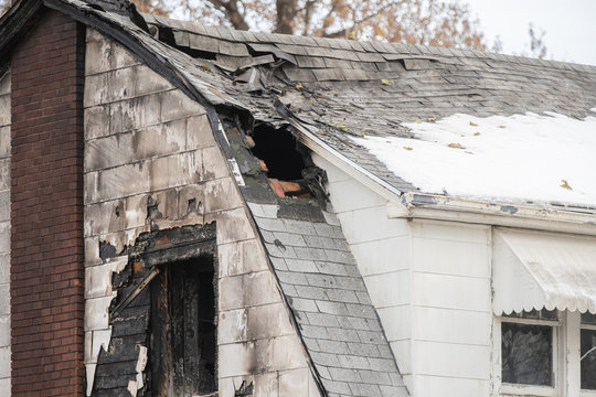 Extensive Roof Damage From A Structure Fire