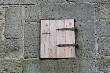 Old Rustic Wooden Door in Wall