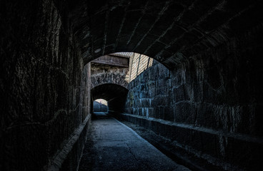 Old creepy underground stone tunnel. Halloween Locations