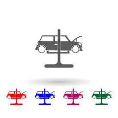 Car on a lift multi color icon. Simple glyph, flat vector of car repear icons for ui and ux, website or mobile application