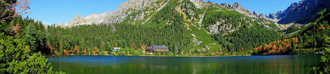 Panoramic photo of Poprad Lake with mountains in the background in High Tatras National Park, Slovakia
