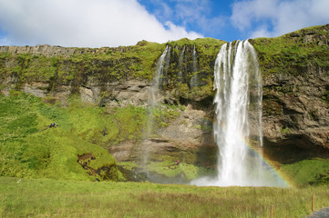 Seljalandsfoss waterfall in the river Seljalands a 60 meters (197 ft) cascade, next to route 1 in the southern Iceland
