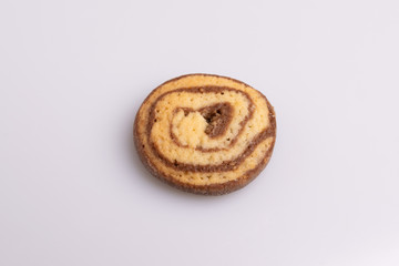 Home made cookies with chocolate, butter and vanilla, isolated on white background, soft light, angle view, copy space