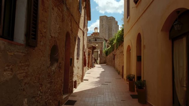 Walking along the old town of San Gimignano, Tuscany, Italy, a UNESCO World Heritage Site