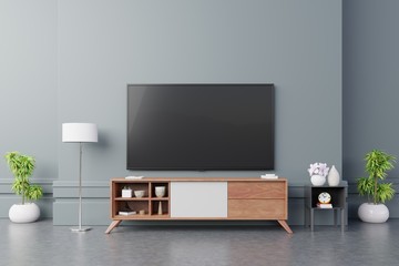 Smart TV on the dark blue wall in living room,minimal design.