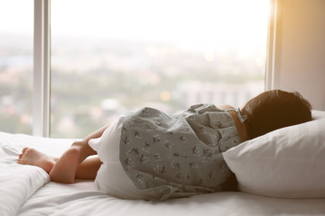 Asian child or kid girl sleeping alone and lonely depress or comfortably and sweet dream for relax...
