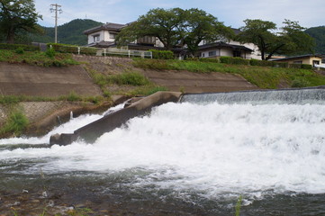 Fototapeta na wymiar Japanese river flow water splash