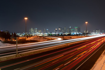 Naklejka na ściany i meble Night city background highway road with car lights
