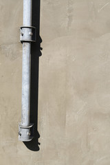 コンクリート壁と配管のパイプ