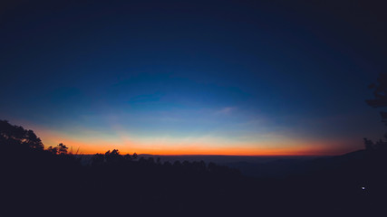 sunset and twilight light in the forest on the mountain