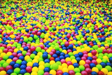 Fototapeta na wymiar Bright background of plastic balls