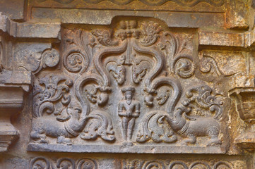 Fototapeta na wymiar Carved sculpture on the wall of Kopeshwar Temple, Khidrapur, Maharashtra, India