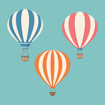 Set of striped hot air balloons on a blue background. Vector illustration. Icon collection.