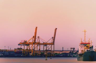 Obraz premium Logistics and transportation of International Container Cargo ship in the ocean at Sunshine sky, Freight Transportation, Shipping