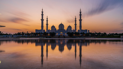 silhouette of Sheikh zayed grand mosque  in sunset