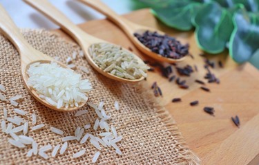 rice three color with wood spoons on the table