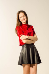 Portrait of young beautiful girl. Photo-shoot executed in the studio.
