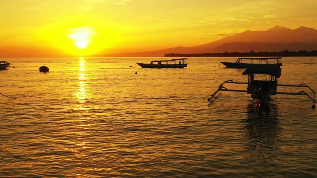 Melaque Beach In Mexico - Beautiful Sunset Scenery With Silhouettes Of Floating Boats And Mountain - Wide Shot