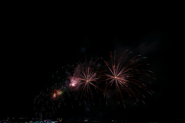 Fototapeta na wymiar Fireworks light up the sky with dazzling display
