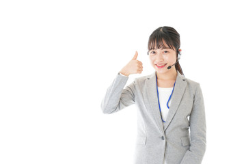 指をさすコールセンターの女性