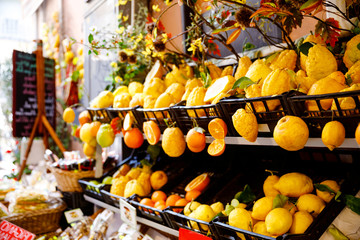 Different variety of lemons for sale. Traditional delicious Italian lemons in Taormina, Sicily, Italy on farmer market.