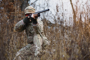 Hunting permit. Man brutal gamekeeper nature background. hunter spend leisure hunting. Hunter hold riffles. Focus and concentration of experienced hunter. Hunting and trapping seasons.