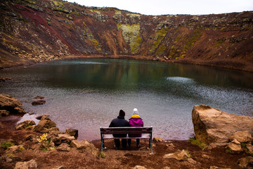 Kerid volcanic crater lake in Iceland. Landscape with red volcanic stones on the top of Kerid Crater with blue crater lake in Iceland © Nomad Pixel