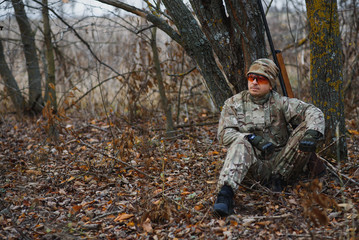 Hunting permit. Man brutal gamekeeper nature background. hunter spend leisure hunting. Hunter hold riffles. Focus and concentration of experienced hunter. Hunting and trapping seasons.