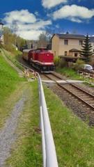 Fototapeta premium pociągiem przez góry rudy