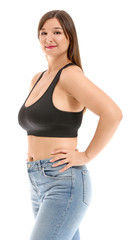 Young body positive woman on white background