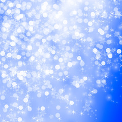 Obraz premium Abstract silver light on blue blurred background. Christmas background