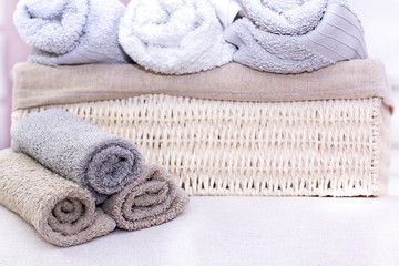 Stack of bath towels on background closeup