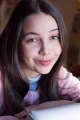 Portrait of beautiful teen girl looking at camera