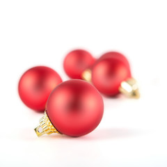 Red Christmas balls isolated on a white background