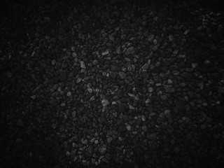 Black pebble stones texture background. Can be use for your design, advertising, backdrop, product display or montage