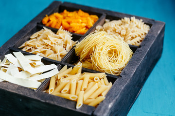 italian pasta in a box. Raw pasta. Farfale, cappelli angelo, spaghetti, cavatelli, noodles