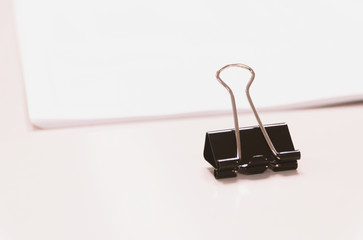 PaperClip Business reports and Accounting of documents on Office background.