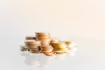 Money Coins stacked on each other in different positions.