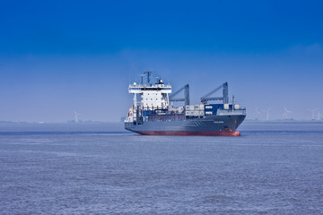 Container ship or multi-role vessel on the Elbe to Hamburg, at Brunsbuettel, Lower Saxony,