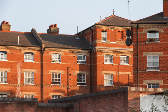 Terrace of red brick built houses around Cambridge Heath in London