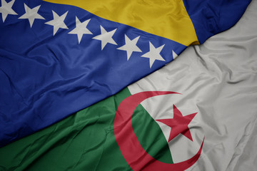 waving colorful flag of algeria and national flag of bosnia and herzegovina.