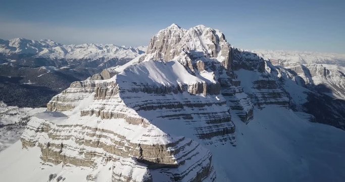 Aerial view of Groste mountain, Dolomites, Alps, Brenta Group, peak in winter, an aerial view in a sunny day