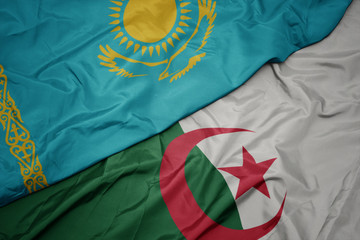 waving colorful flag of algeria and national flag of kazakhstan.