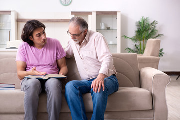 Young student and his father