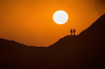  Beautiful orange sunrise at volcano Erta Ale. Ethiopia. African landscape