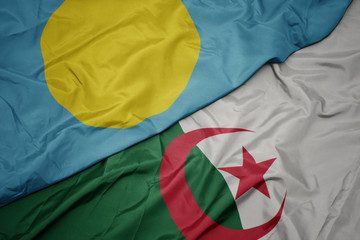 waving colorful flag of algeria and national flag of Palau .