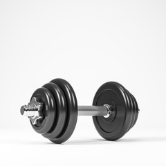 Heavy black professional dumbbell for fitness and bodybuilding. Side view with white background.