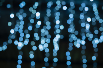 Fototapeta premium glitter sparkle light blurred bokeh background for a happy holiday, Christmas, new year decoration concept
