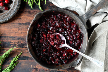 Cranberry sauce in a pan, christmas, rustic
