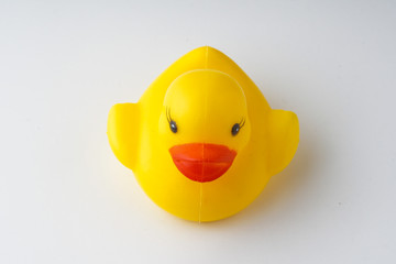 Rubber duckie day concept. Yellow rubber dack over black abd white background